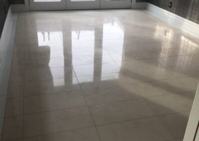 A tile floor and a sliding glass door