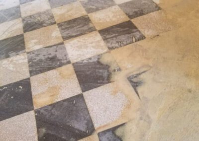 A dusty black and white checked floor